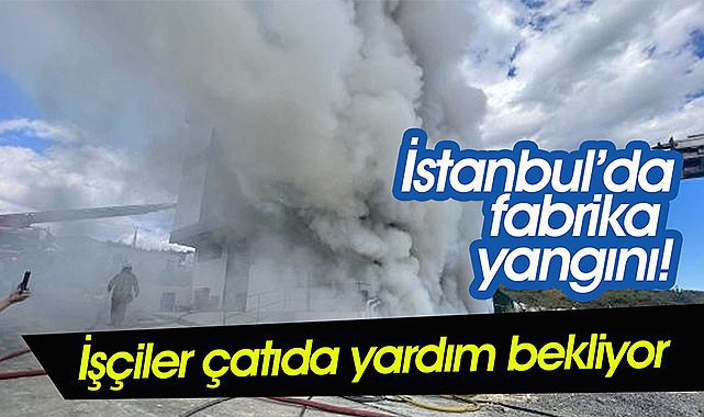 Fabrikada yangın çıktı işçiler çatıda mahsur kaldı