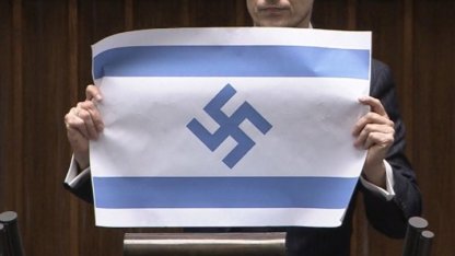 Polonyalı milletvekili Berkowicz, parlamentoda Nazi sembollü İsrail bayrağı açtı
